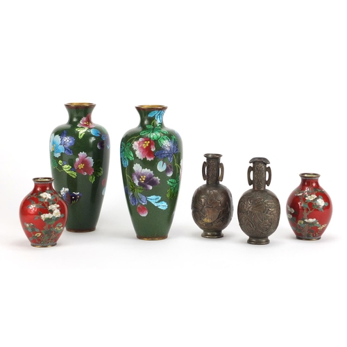 2420 - Three pairs of Japanese vases including two cloisonné examples enamelled with flowers, the largest 1... 