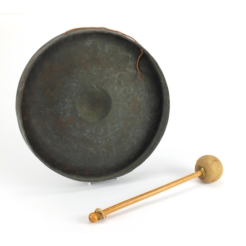 2311A - Large brass gong with striker, 42.5cm in diameter