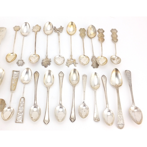 2550 - Georgian and later silver flatware including souvenir teaspoons, serving spoons and napkin ring, var... 