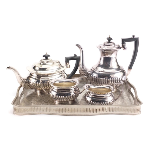 474 - Silver plated four piece tea service and a gallery tray