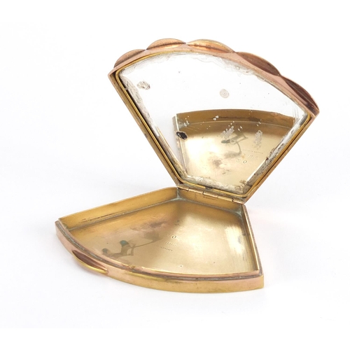 661 - French gilt metal and black enamel compact, 10cm wide