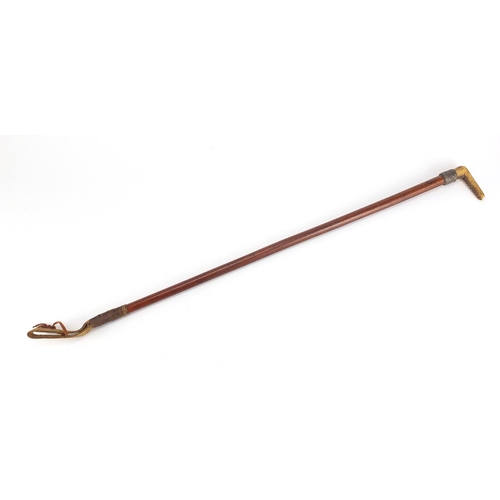 343 - Malacca riding crop with horn handle and silver collar, 78cm in length