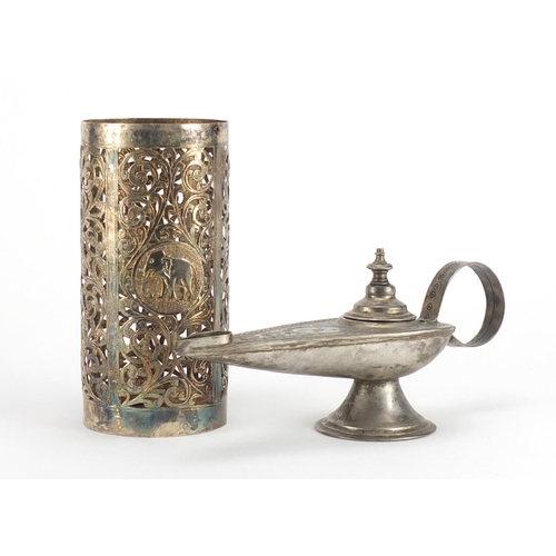 793 - Middle Eastern silver coloured metal oil lamp and bottle holder