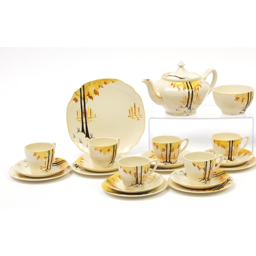 2348 - Art Deco teaware including teapot and trio's, each decorated with stylised trees