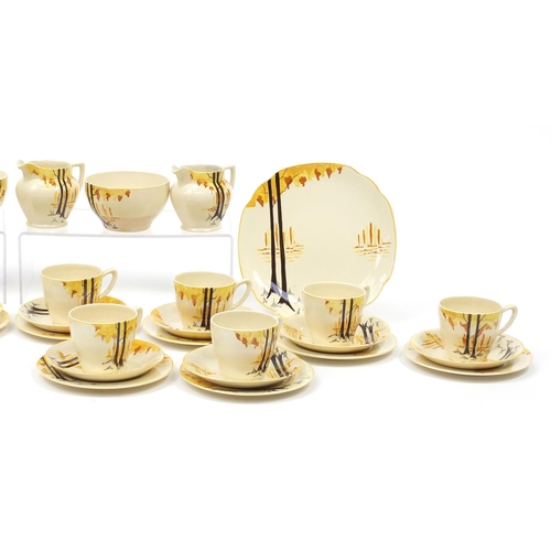2348 - Art Deco teaware including teapot and trio's, each decorated with stylised trees
