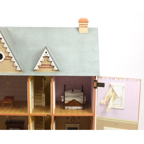 2091 - Large wooden dolls house with a large selection of furniture and accessories, the house with The Dol... 