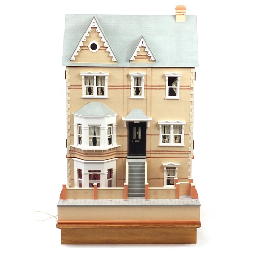 2091 - Large wooden dolls house with a large selection of furniture and accessories, the house with The Dol... 