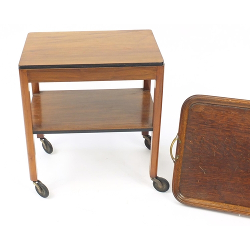 183 - Walnut two tier trolley and an oak tray with brass handles