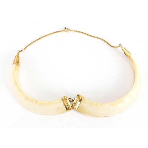 640 - Unmarked gold mounted necklace