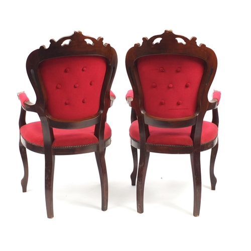 12 - Pair of French style mahogany open armchairs with red button back upholstery, 107cm high