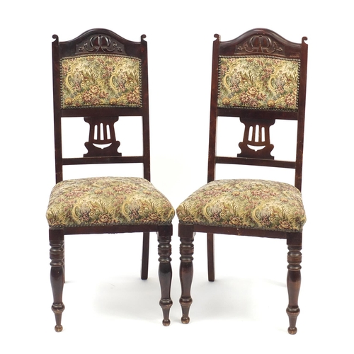52 - Pair of Art Noveau mahogany side chairs with floral upholstery, 104cm high