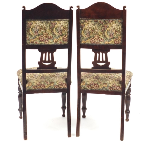52 - Pair of Art Noveau mahogany side chairs with floral upholstery, 104cm high