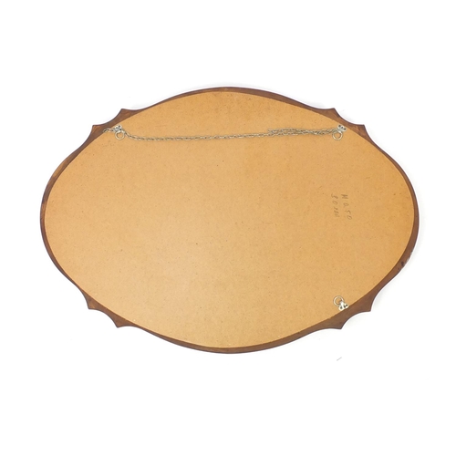 96 - Oval mahogany framed mirror with bevelled glass, 85cm x 62cm