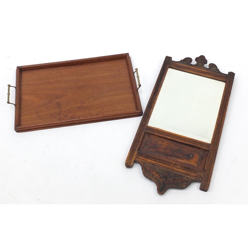 187 - Oak framed wall hanging mirror and a mahogany tray with brass handles