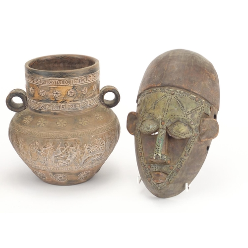 800 - Pair of African face masks and a terracotta vessel