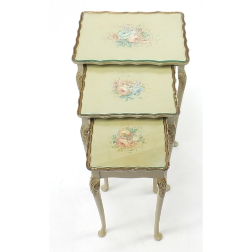 59 - Nest of three Shabby Chic  tables, hand painted with flowers, the largest 55cm H x 47cm W x 36cm D