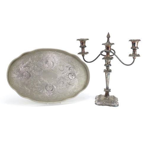 236 - Silver plated three branch candelabra and an oval gallery tray