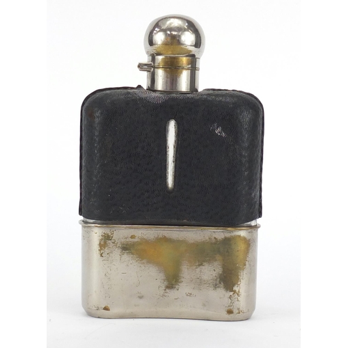 635 - Oversized silver plated and leather hip flask, 19cm high