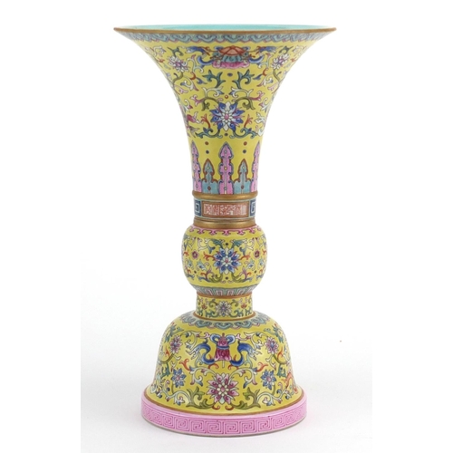 179 - Chinese porcelain two section Gu vase, hand painted in the famille rose palette with daoist emblems ... 