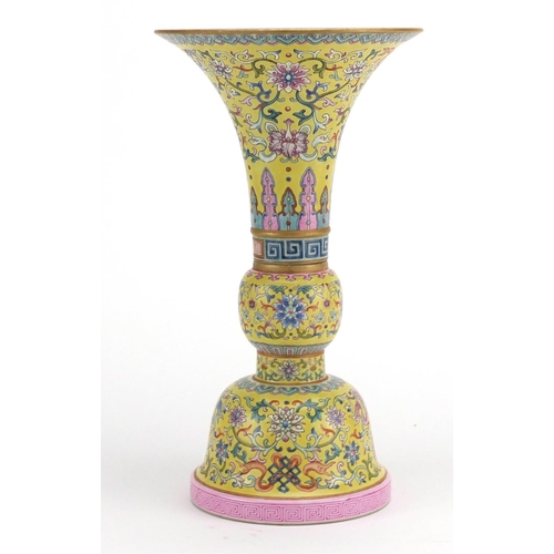 179 - Chinese porcelain two section Gu vase, hand painted in the famille rose palette with daoist emblems ... 