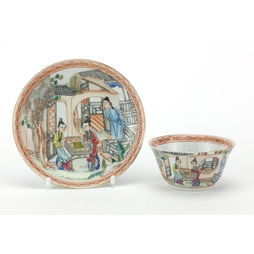 216 - Chinese porcelain tea cup and saucer, finely hand painted in the famille rose palette with figures i... 
