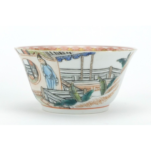 216 - Chinese porcelain tea cup and saucer, finely hand painted in the famille rose palette with figures i... 