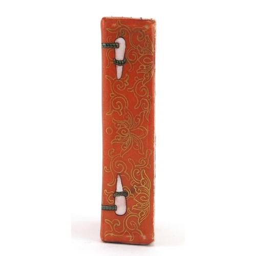 219 - Chinese iron red porcelain book design paperweight, hand painted with script and foliate motifs, 8.5... 