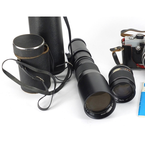 892 - Praktica camera with lenses and accessories
