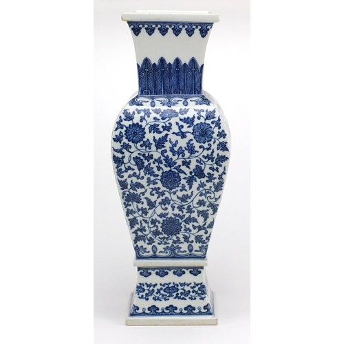 232 - Large Chinese blue and porcelain square section vase, hand painted with flower heads amongst foliate... 