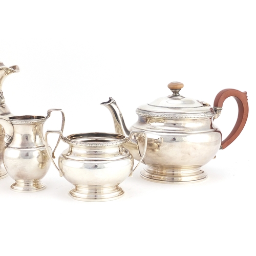 518 - Silver four piece tea set, by F G Richards, Birmingham 1941, the water pot 21.5cm high, approximate ... 