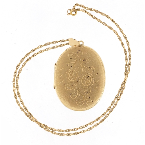 594 - Large 9ct gold locket on a 9ct gold rope twist necklace, the locket 6.5cm in length, approximate wei... 