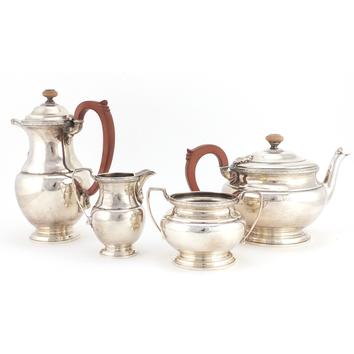 518 - Silver four piece tea set, by F G Richards, Birmingham 1941, the water pot 21.5cm high, approximate ... 