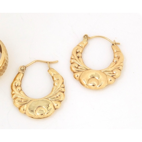 2655 - Two pairs of 9ct gold hoop earrings, the largest 2.4cm in diameter, approximate weight 4.2g