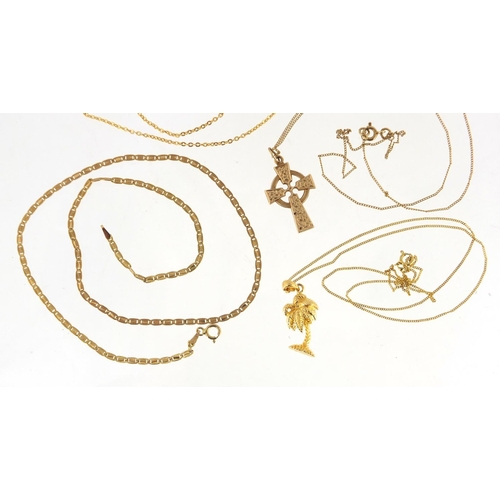 2650 - Five 9ct gold necklaces and two gold coloured metal pendants, approximate weight 9.9g
