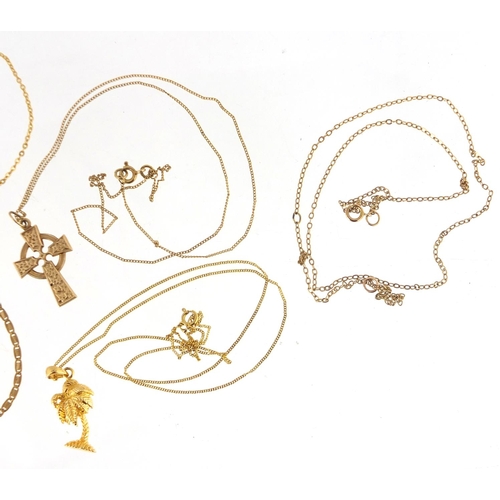 2650 - Five 9ct gold necklaces and two gold coloured metal pendants, approximate weight 9.9g
