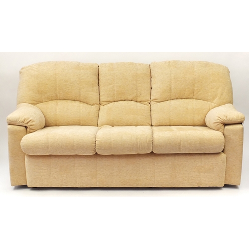 2054 - Beige upholstered three seater settee, 210cm wide