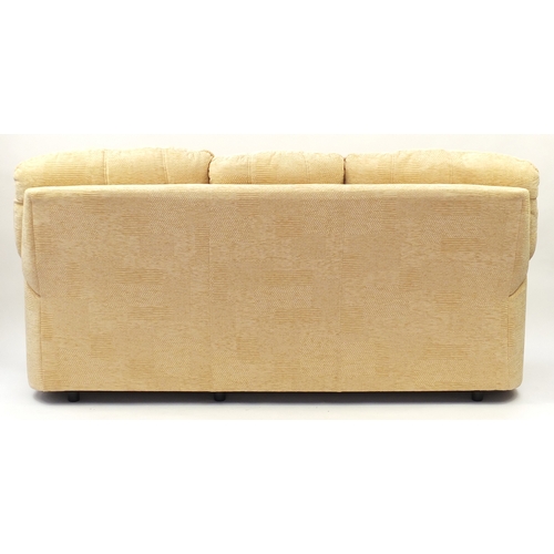 2054 - Beige upholstered three seater settee, 210cm wide