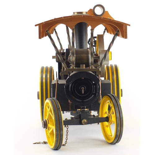 102 - Fareham Engineering Co one inch scale traction engine, with accessories and parts, 52cm in length