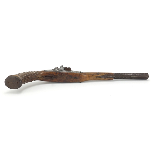 169 - Early 19th century walnut percussion cap pistol, 42cm in length