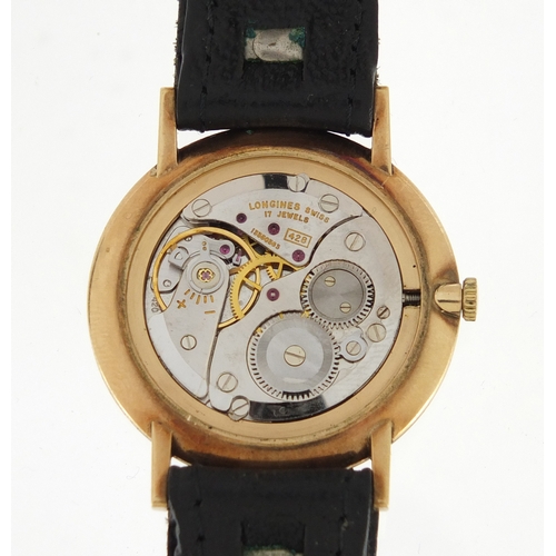 673 - Gentleman's 9ct gold Longines wristwatch, the movement numbered 13350365, with box and paperwork, 3.... 