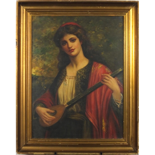 2269 - Portrait of a female playing a musical instrument, Pre-Raphaelite school oil on board, bearing a mon... 