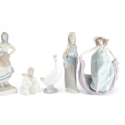 470 - Seven Spanish figures and figurines including Lladro and Nao, the largest 23cm high