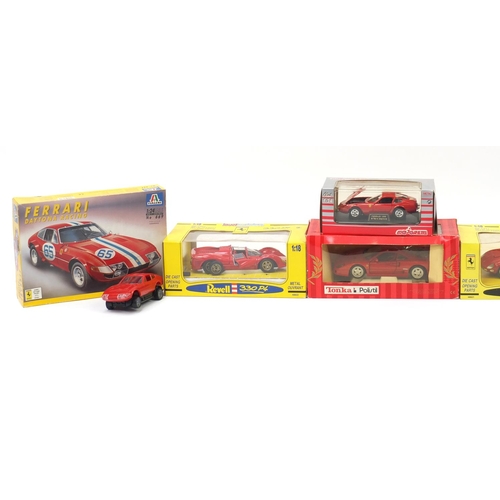 482A - Five boxed die cast vehicles and model kit including Revell Ferrari's and a Maisto Jaguar XJ220