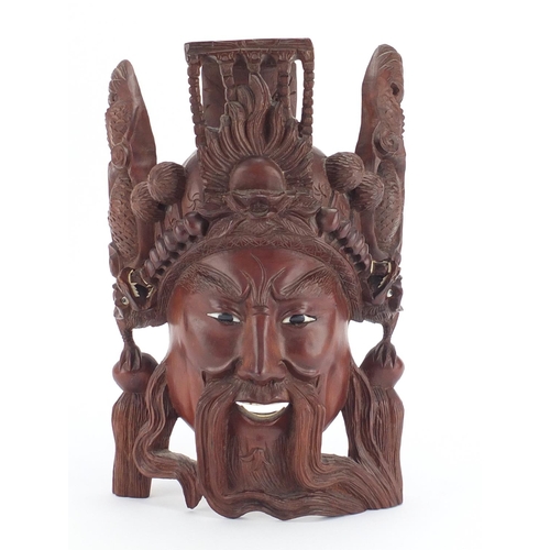 803 - Chinese carved hardwood wall mask, with glass eyes, 31cm in length