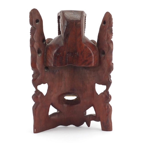 803 - Chinese carved hardwood wall mask, with glass eyes, 31cm in length
