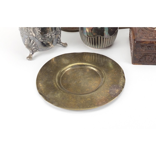 833 - Metal and woodenware including a brass plate finely engraved with flowers, pair of enamelled  brass ... 