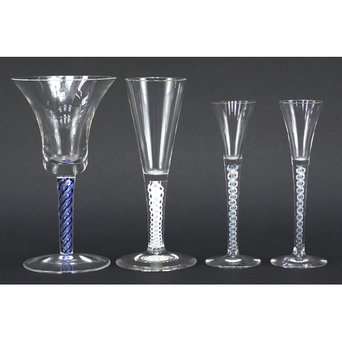 2346 - Four George III style glasses including three with air twist stems, the largest 17.5cm high