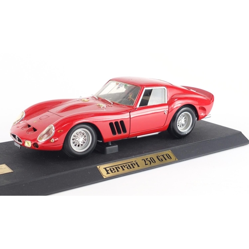 2433 - Revell 64 Ferrari 250 GTO die cast vehicle on wooden plinth base, scale 1:12 with box, 36cm in lengt... 