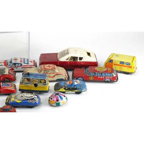 2440 - Vintage and later tin plate vehicles including Japanese and German examples, the largest approximate... 