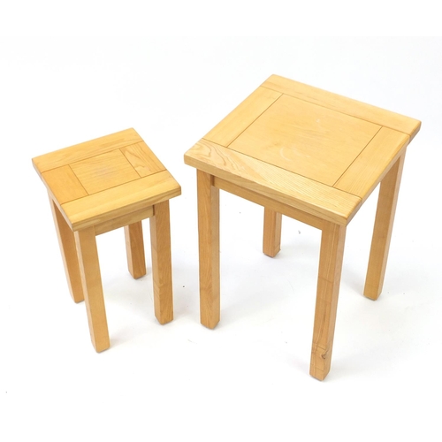 182 - Nest of two light oak occasional tables, the largest 59cm H x 40cm W x 40cm D